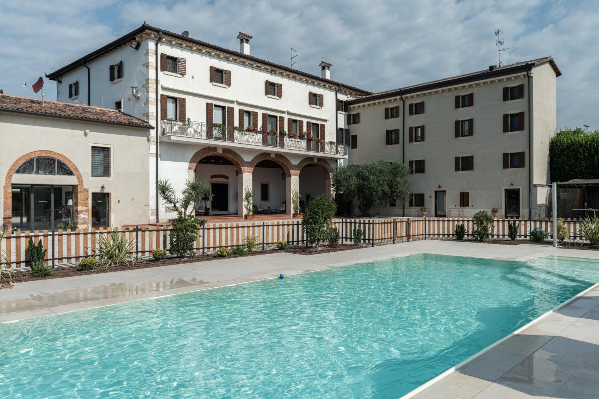 Verdeolivo 1876 - Apartments & Pool Mezzane di Sotto Buitenkant foto